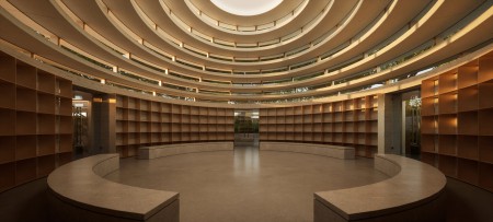 CGI of a columbarium, a communal funeral rememberance space. A circular structure made from rings of concrete.